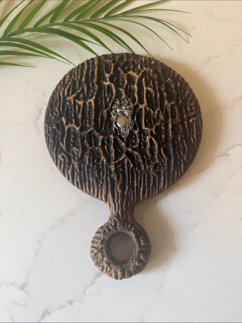 Antique Handheld Beveled Mirror with Faux Bois Handle and Sterling emblem FLAW